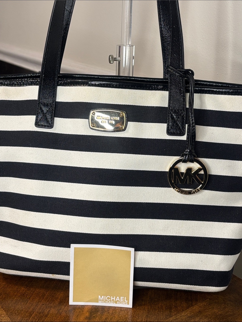 Michael Kors Black and White Striped Canvas Tote with Silver MK Charm - Picture 14 of 16